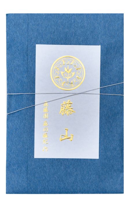 金箔押しの紺色の贈答用パッケージ